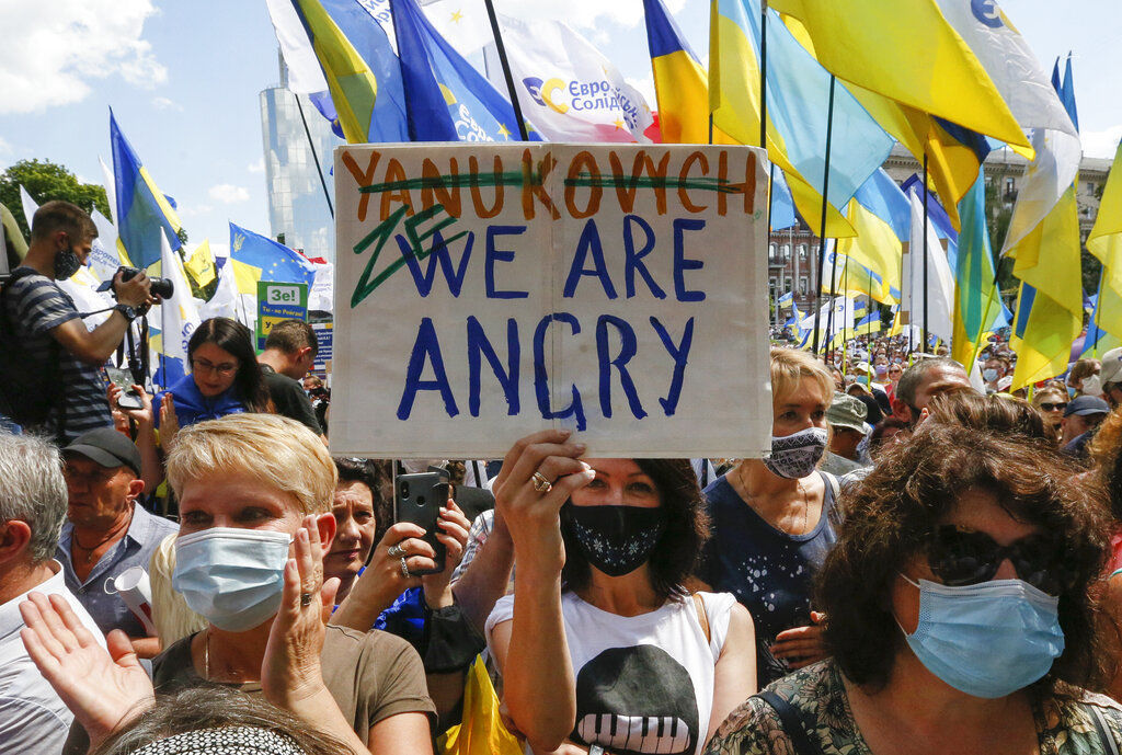 APTOPIX Virus Outbreak Ukraine Poroshenko Trial